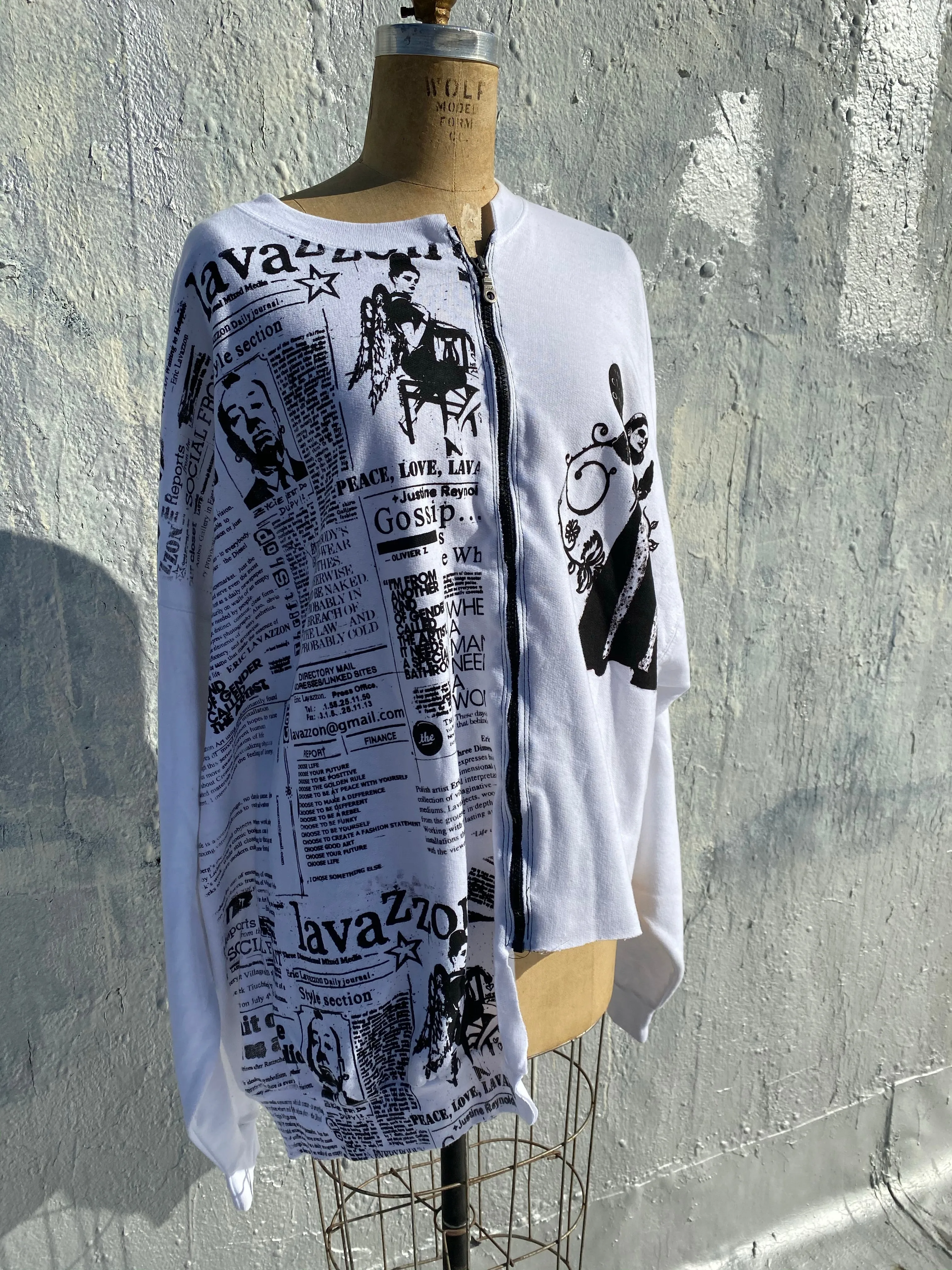 Lavazzon Asymmetrical zippered sweatshirt newsprint. Good clothes open all doors. One size