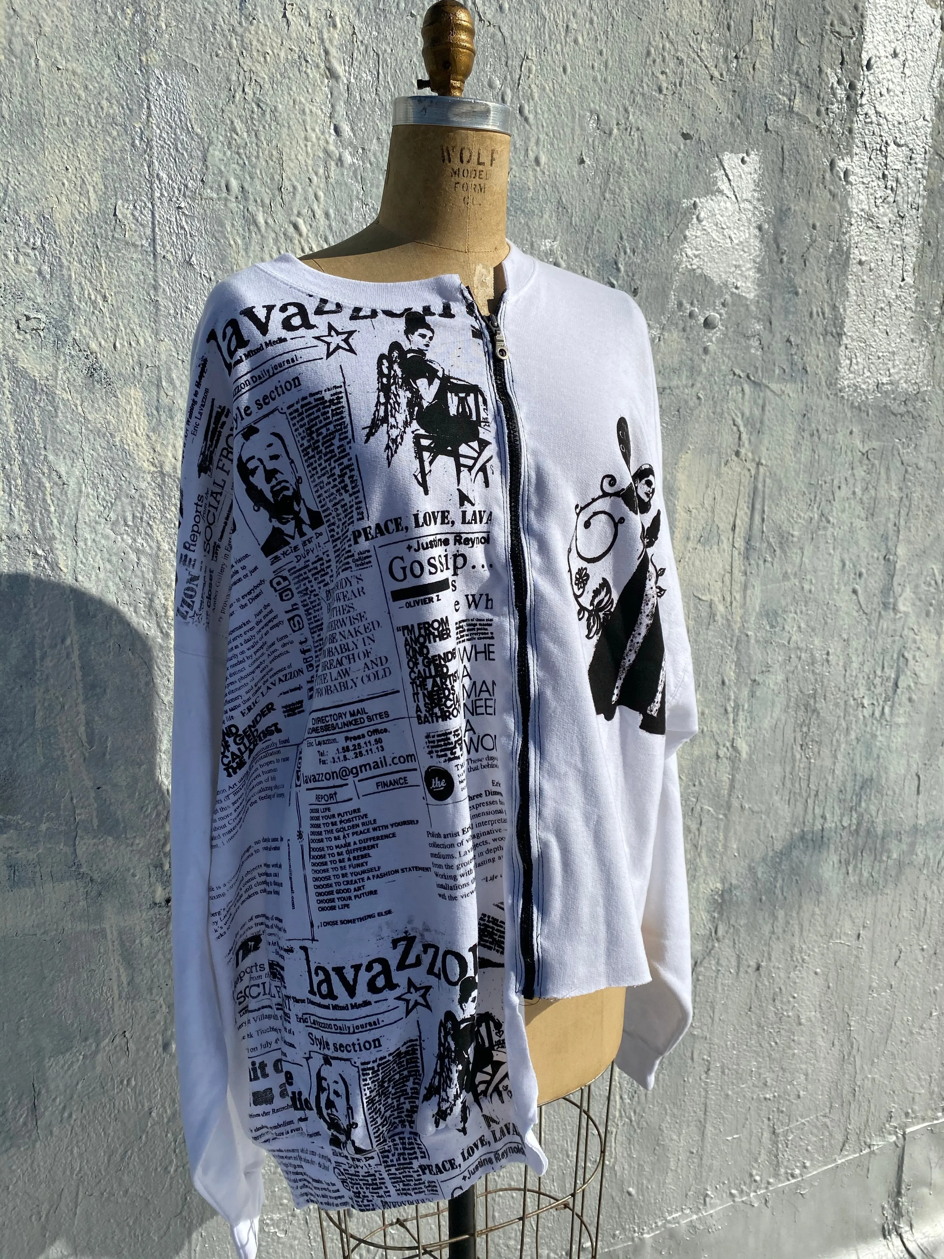 Lavazzon Asymmetrical zippered sweatshirt newsprint. Good clothes open all doors. One size